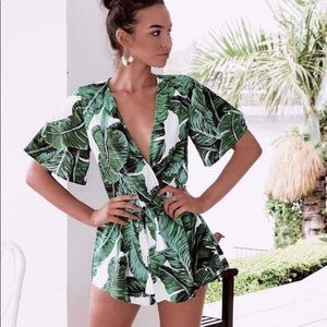 SOLD Palm leaf deep V vacation romper (s)